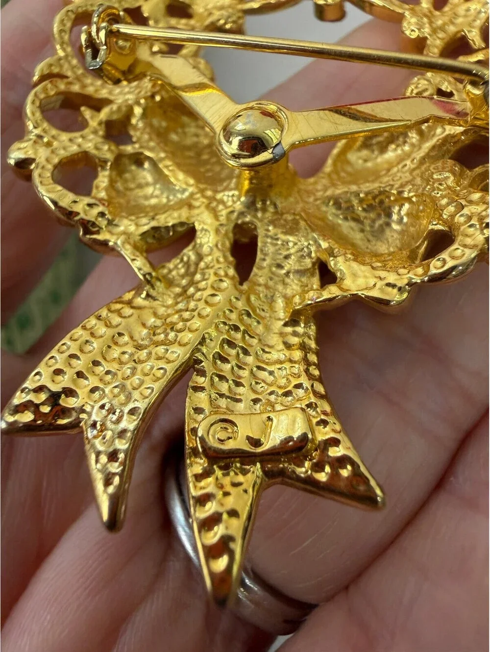 Vintage JJ Gold Tone Wreath Brooch with Bow and Rhinestones
